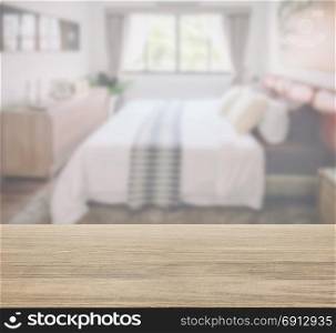 wooden table top with blurred background bedroom in classic style interior