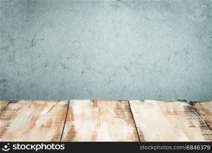 Wooden table top. Wooden table top with blue wall background