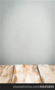 Wooden table top. Wooden table top with grey wall background