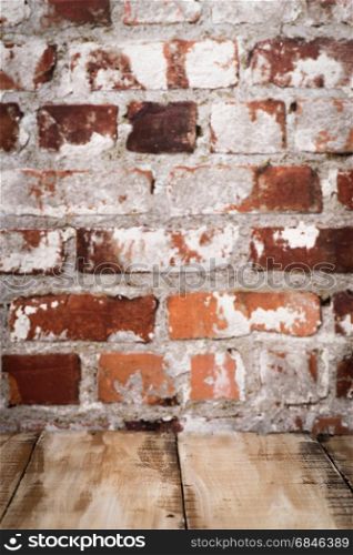 Wooden table top. Wooden table top with Red brick wall background.