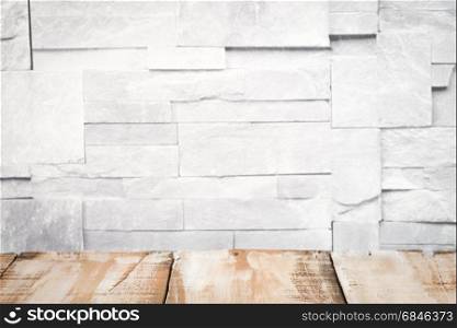 Wooden table top. Wooden table top with stone wall background