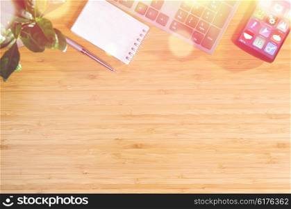 wooden table with office related objects, modern stylish work place, view from above