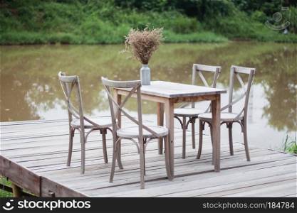 Wooden tables outside coffee shop, stock photo
