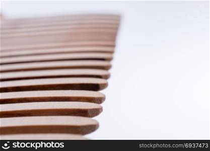 Wooden Teeth of a Hair Comb on a white background