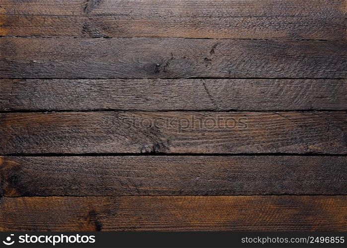 Wooden texture of dark wood planks top view