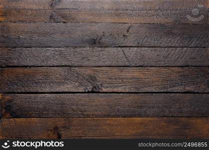 Wooden texture of dark wood planks top view