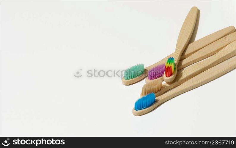 wooden toothbrushes on a white background, zero waste. Top view