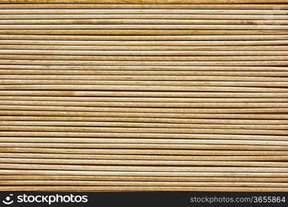 Wooden toothpicks are laid out in a number of