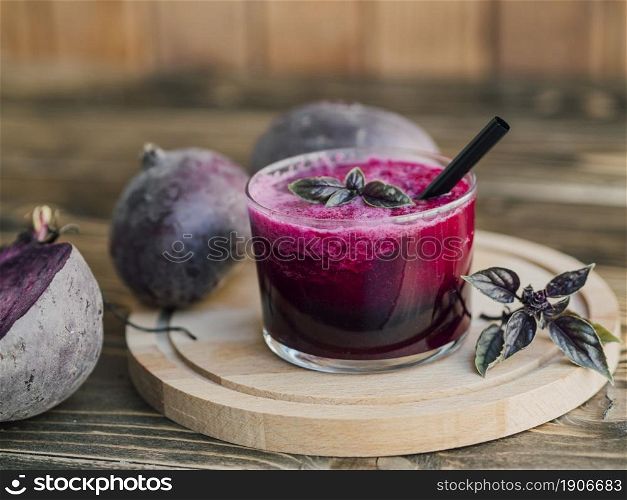 wooden tray with glass beetroot juice. High resolution photo. wooden tray with glass beetroot juice. High quality photo