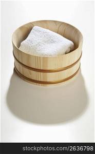 Wooden tub and towel
