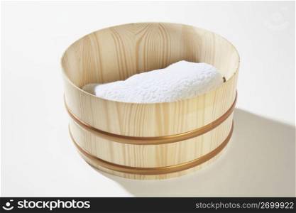 Wooden tub and towel