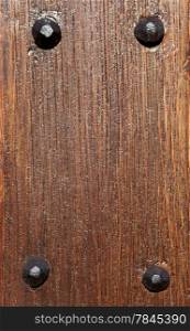 Wooden wall texture, brown wood with rivets background