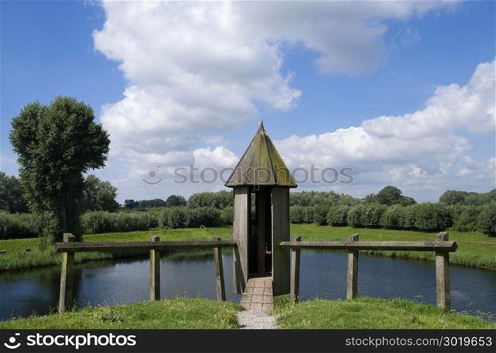 Wooden watchtower on the defensive wall around Loevestein castle in the Dutch province Gelderland. Watchtower Loevestein near Poederoijen