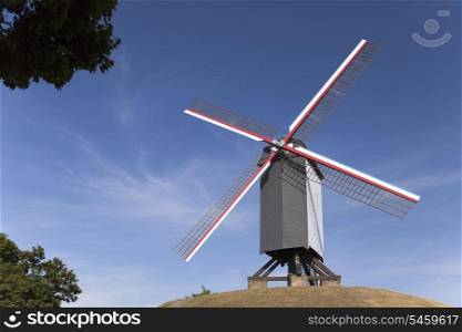 Wooden windmill on the hill in Bruges, Belgium&#xA;