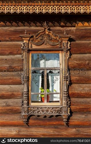 Wooden windows with frames, traditional old Russian architecture