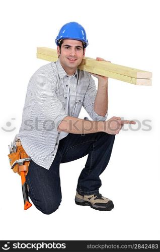 woodworker pointing at something