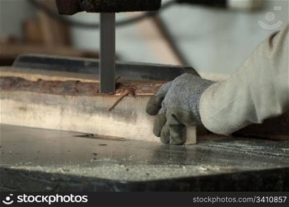 Woodworking factory worker who cut on circular machine