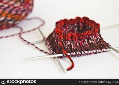 Woolen thread and knitting needle with shallow dof