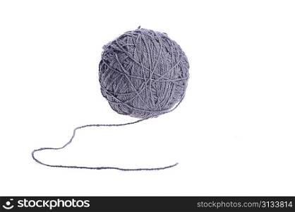 woollen threads lie on table knitting