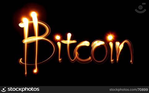 Word Bitcoin and sign. Light painting