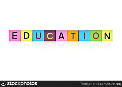 word EDUCATION formed with wooden letter blocks