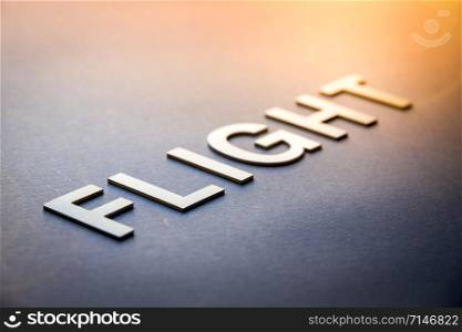 Word flight written with white solid letters on a board. Word flight written with white solid letters