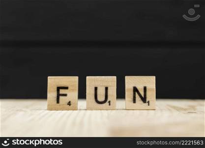 word fun spelt with wooden letters