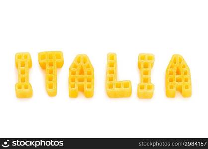 Word Italia written with pasta shapes on white