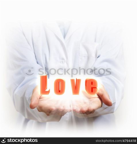 Word love. A word Love in the hand of a person