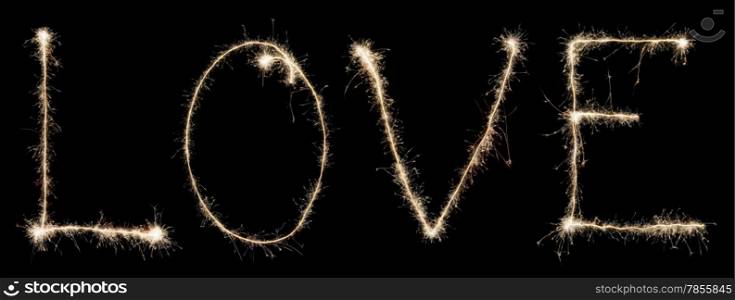 word love from sparkler isolated on black background