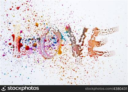 word love made with watercolor droplets
