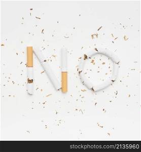 word no made from broken cigarette with tobacco isolated white background