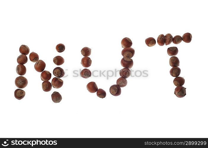 word NUT made from hazelnuts on white