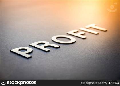 Word profit written with white solid letters on a board. Word profit written with white solid letters