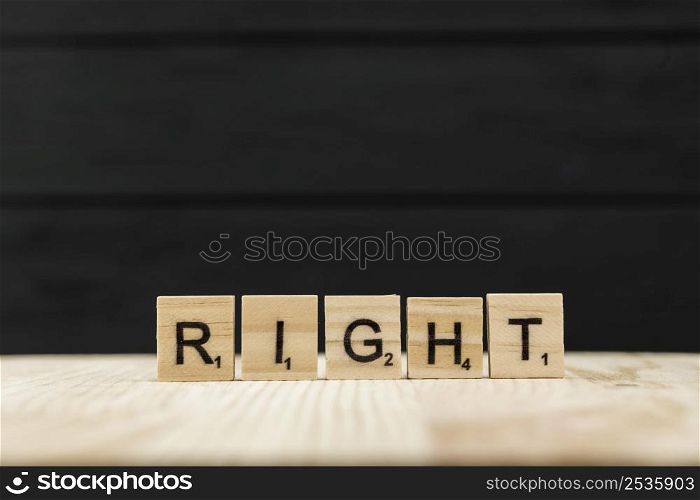 word right spelt with wooden letters