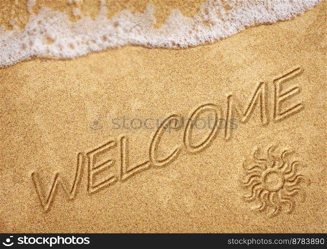 Word Welcome on beach - concept holiday background