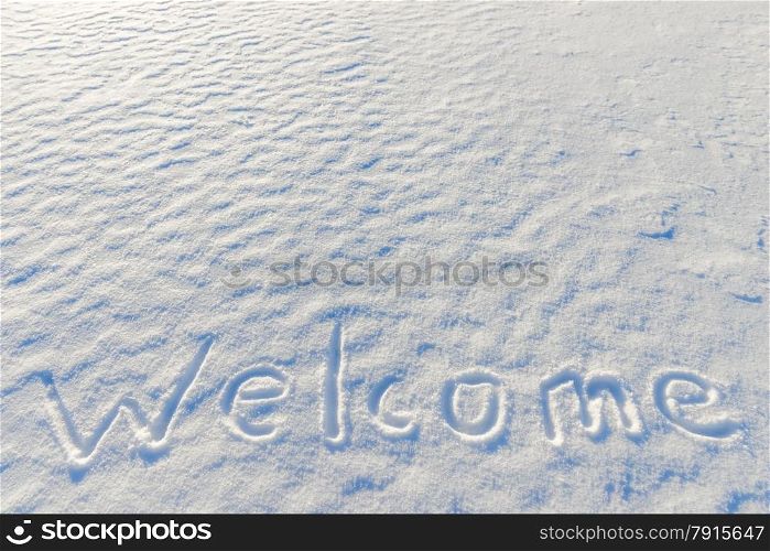 word welcome written on the snow surface