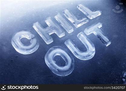 "Words "Chill Out" made of real ice letters on ice background."