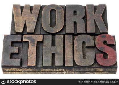 work ethics - isolated word in vintage letterpress wood type with ink patina