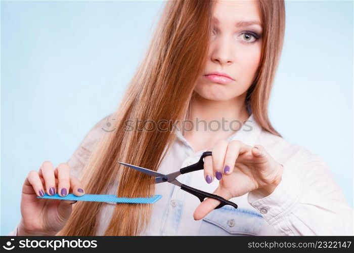 Work hairdo coiffure hairstyle concept. Female hairdresser presenting tools. Young professional beautican cheerfully showing her job.. Female hairdresser presenting tools.