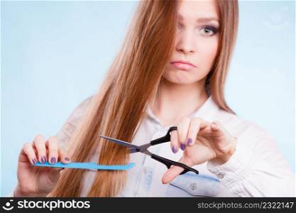Work hairdo coiffure hairstyle concept. Female hairdresser presenting tools. Young professional beautican cheerfully showing her job.. Female hairdresser presenting tools.