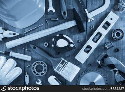 work tools and instruments on wooden background