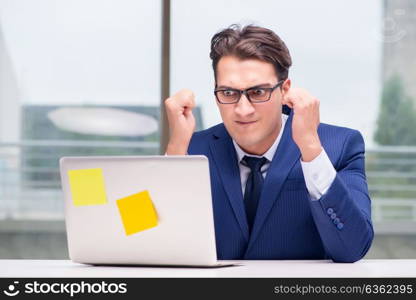 Workaholic businessman overworked with too much work in office