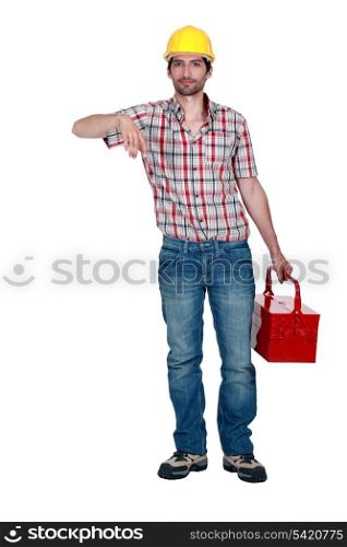 Worker carrying a toolbox.