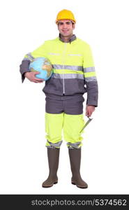 Worker carrying globe under arm