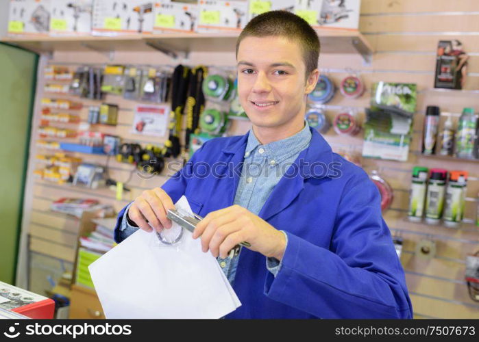 worker holding a piece of paper