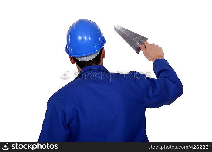 Worker holding a trowel