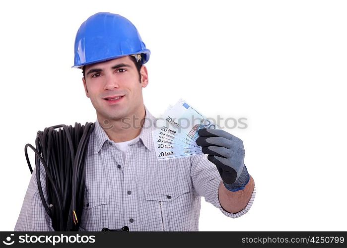 Worker holding bunch of bank notes