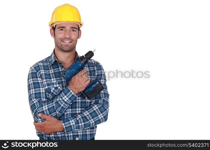 Worker holding cordless drill