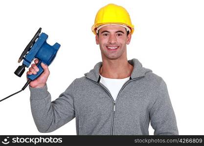 Worker holding power sander